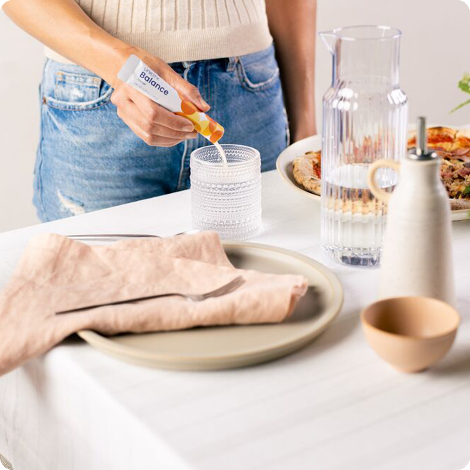 Mixing Unicity Balance with water before a meal
